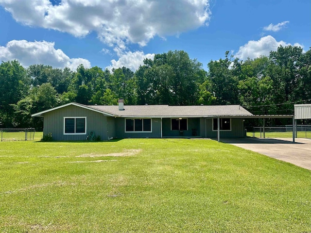 3605 Lawn Oak Dr, Orange, TX 77632 - ranch-style house featuring driveway and a carport