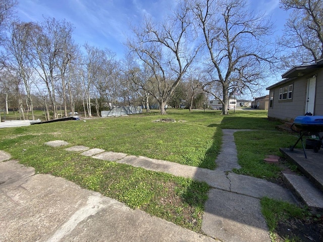 3600 Main Ave, Groves, TX 77619 - view of grassy yard