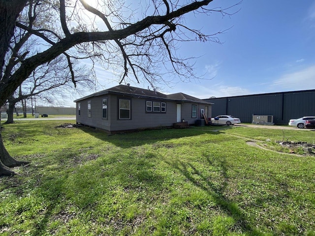 3600 Main Ave, Groves, TX 77619 - view of home's exterior featuring a yard