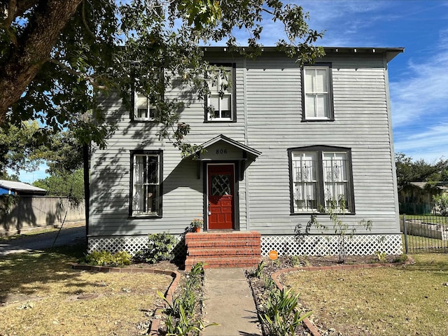 view of front of property with a front yard