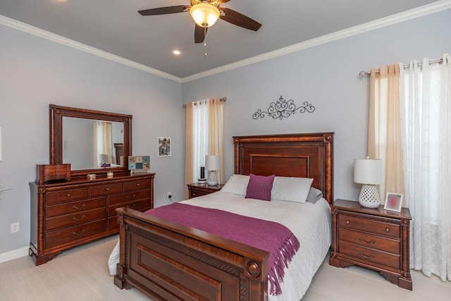 bedroom with ornamental molding, baseboards, and a ceiling fan