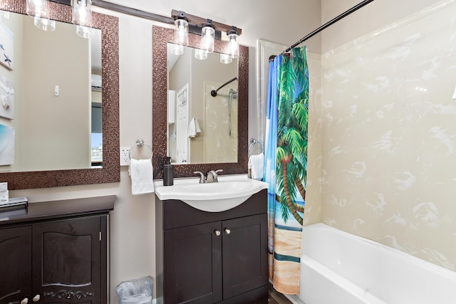 full bath with shower / tub combo with curtain and vanity