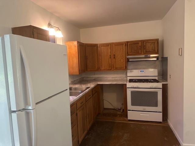 kitchen featuring white appliances, light countertops, under cabinet range hood, brown cabinets, and a sink