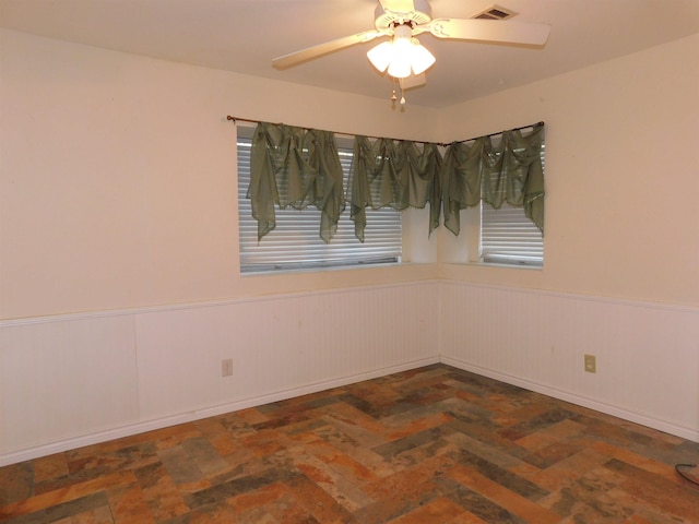 spare room featuring ceiling fan