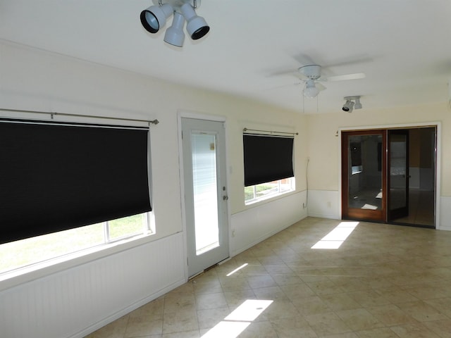 spare room featuring ceiling fan