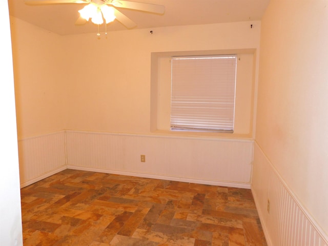 empty room featuring ceiling fan