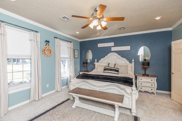 carpeted bedroom with a textured ceiling, ceiling fan, crown molding, and multiple windows