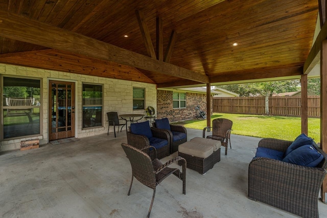 1405 Turner Dr, Bridge City, TX 77611 - fenced backyard with a patio and an outdoor hangout area