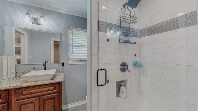1405 Turner Dr, Bridge City, TX 77611 - bathroom featuring a stall shower, vanity, and ornamental molding