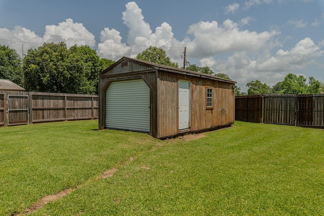 1405 Turner Dr, Bridge City, TX 77611 - view of outdoor structure with a fenced backyard