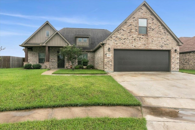 view of front facade featuring a front lawn and a garage