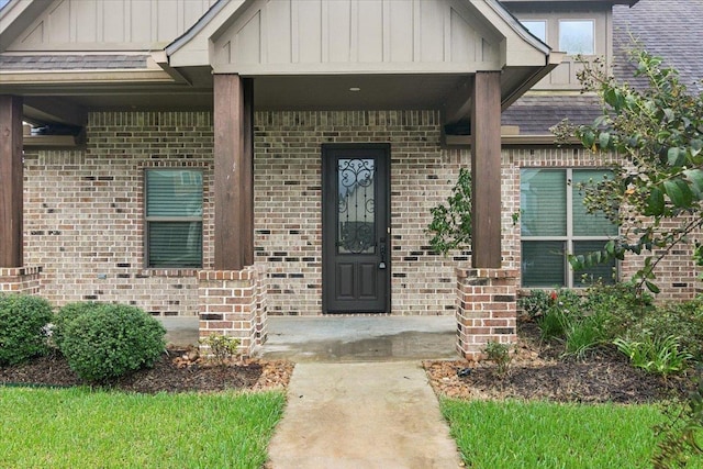 entrance to property with covered porch