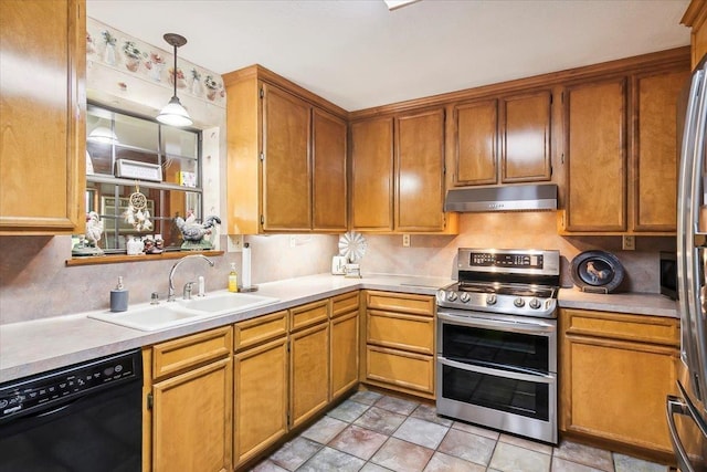 kitchen with pendant lighting, tasteful backsplash, sink, black dishwasher, and double oven range