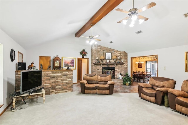 living room with lofted ceiling with beams, carpet flooring, and a fireplace