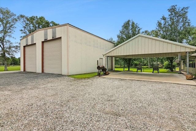 garage with a carport