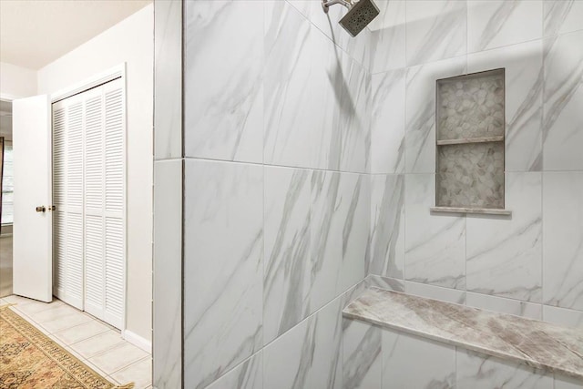 bathroom featuring tiled shower