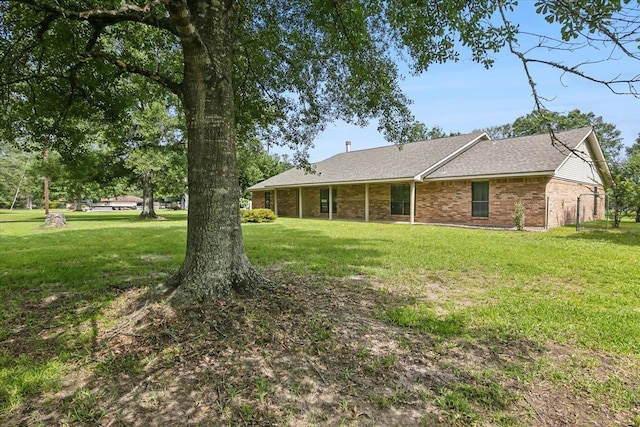 exterior space featuring a lawn