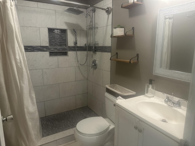 5041 9th St, Port Arthur, TX 77642 - full bath featuring a tile shower, vanity, and toilet