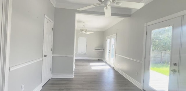 930 Llano St, Port Neches, TX 77651 - corridor featuring healthy amount of natural light, wood finished floors, baseboards, and ornamental molding
