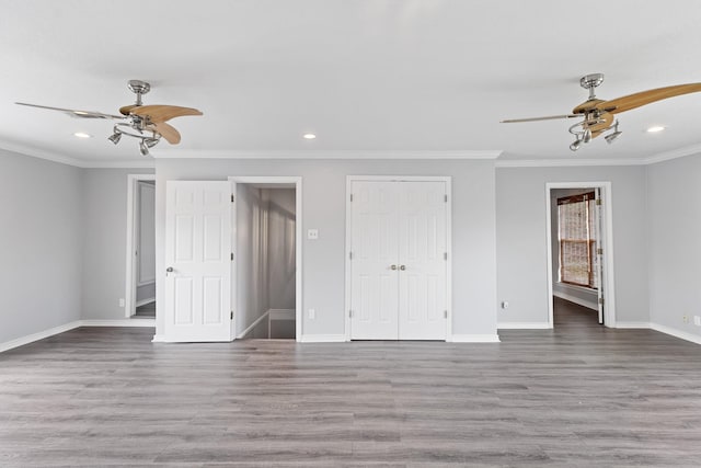 930 Llano St, Port Neches, TX 77651 - unfurnished bedroom with recessed lighting, baseboards, ornamental molding, wood finished floors, and a ceiling fan