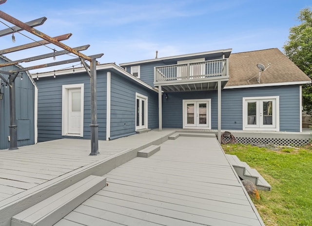 930 Llano St, Port Neches, TX 77651 - back of property featuring french doors, a pergola, a deck, and a yard