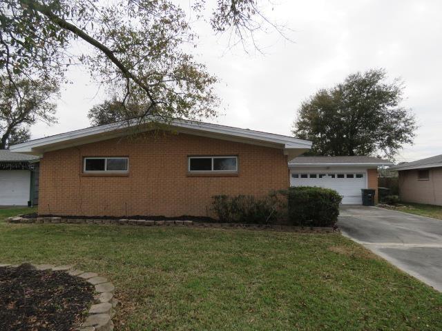 view of home's exterior featuring a yard