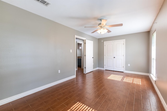 5269 Fairview Dr, Orange, TX 77630 - unfurnished bedroom with baseboards, dark wood-style floors, and a closet
