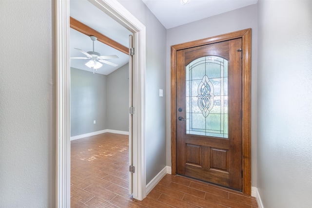 5269 Fairview Dr, Orange, TX 77630 - entrance foyer with dark wood-style flooring, baseboards, ceiling fan, and lofted ceiling