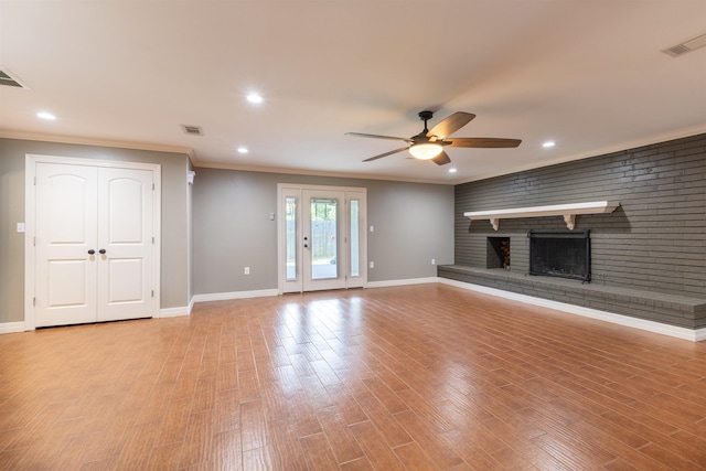 5269 Fairview Dr, Orange, TX 77630 - unfurnished living room featuring ceiling fan, crown molding, recessed lighting, baseboards, and light wood-style floors