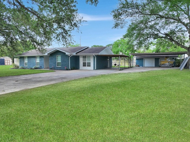 5269 Fairview Dr, Orange, TX 77630 - ranch-style home featuring driveway, a carport, and a front yard