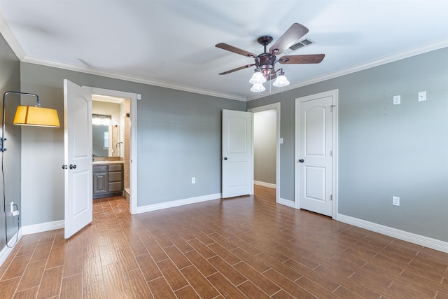 5269 Fairview Dr, Orange, TX 77630 - unfurnished bedroom with baseboards, dark wood finished floors, ornamental molding, and ensuite bath
