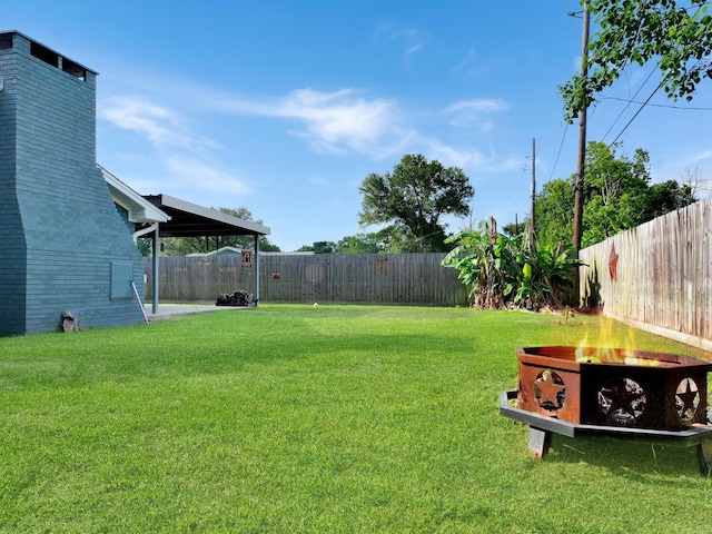 5269 Fairview Dr, Orange, TX 77630 - view of yard with an outdoor fire pit