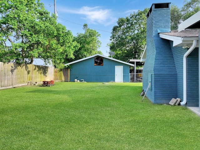 5269 Fairview Dr, Orange, TX 77630 - view of yard with an outbuilding
