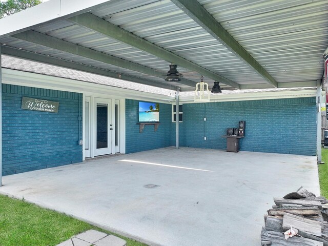 5269 Fairview Dr, Orange, TX 77630 - view of patio / terrace with a ceiling fan and a carport