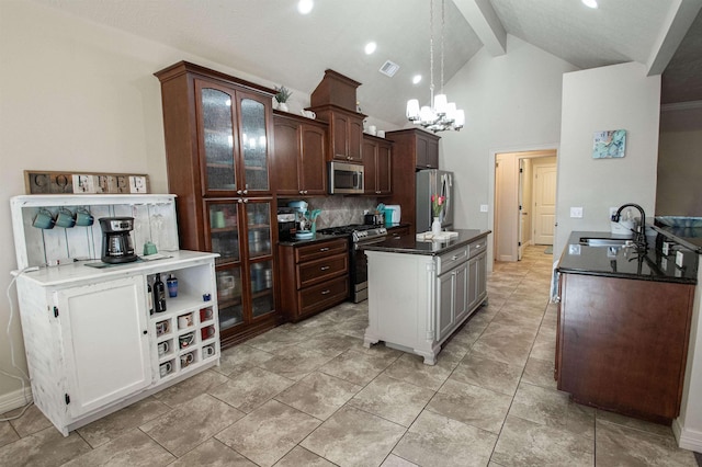 kitchen with sink, beamed ceiling, a chandelier, dark brown cabinets, and appliances with stainless steel finishes