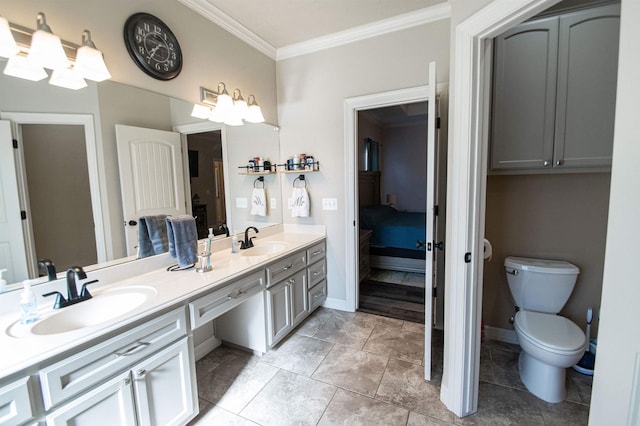 bathroom featuring tile patterned flooring, toilet, vanity, and ornamental molding