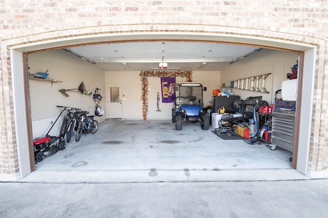 garage featuring a garage door opener