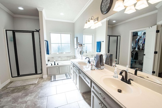 bathroom with tile patterned floors, vanity, crown molding, and independent shower and bath