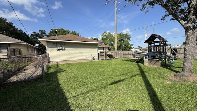 4801 Kent Ave, Groves, TX 77619 - view of yard featuring a playground