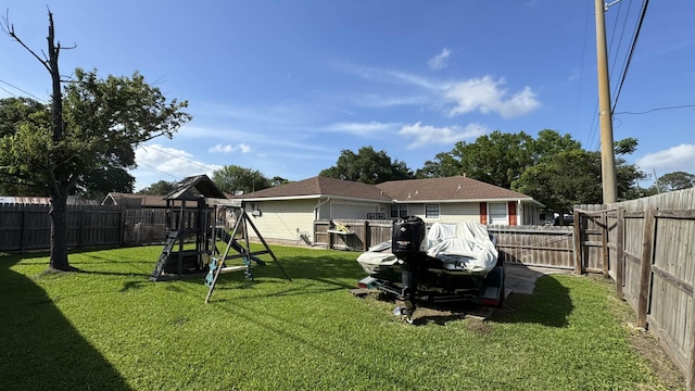 4801 Kent Ave, Groves, TX 77619 - view of yard featuring a playground