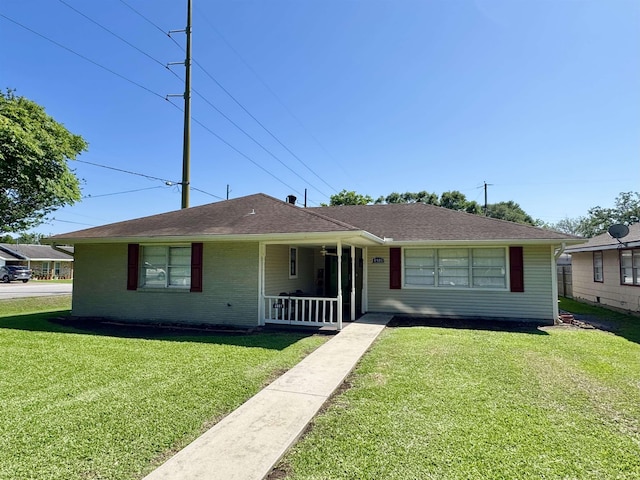4801 Kent Ave, Groves, TX 77619 - view of front of house with covered porch and a front lawn