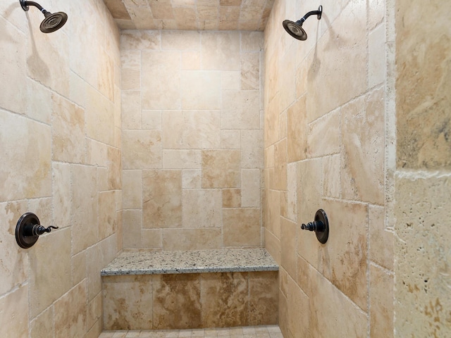 bathroom featuring tiled shower