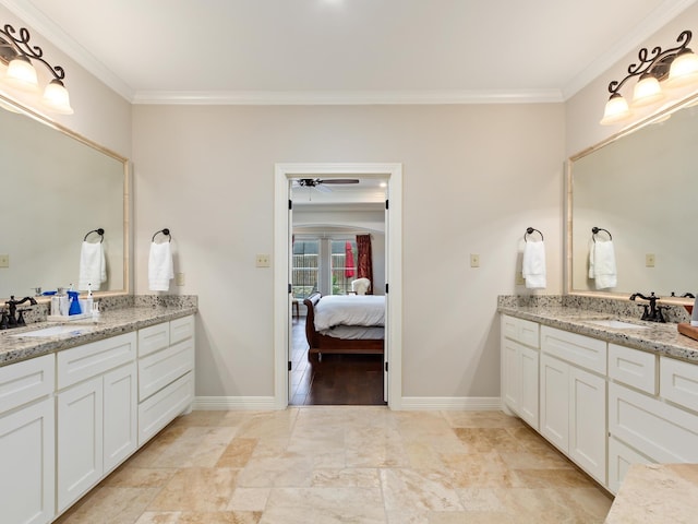 bathroom with vanity, ceiling fan, and crown molding