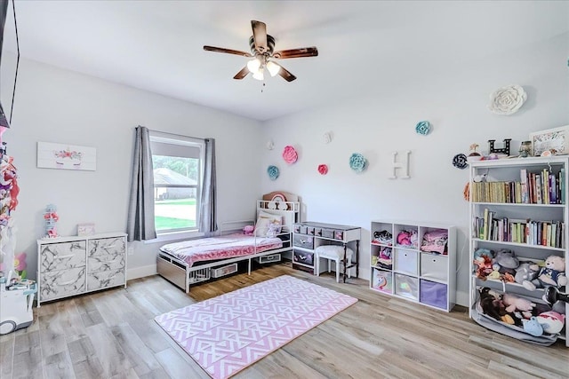4801 Candlewick Dr, Orange, TX 77630 - bedroom featuring wood finished floors and a ceiling fan