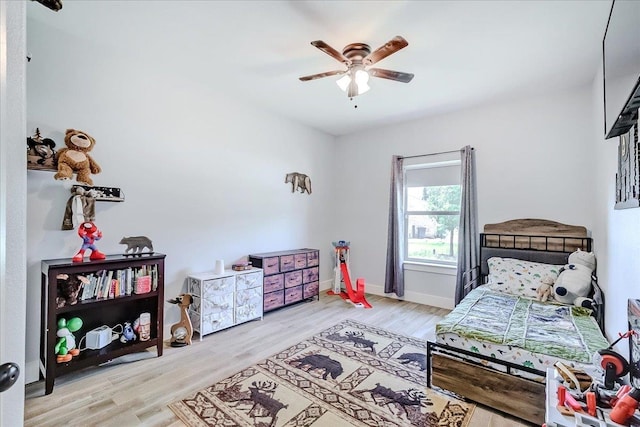 4801 Candlewick Dr, Orange, TX 77630 - bedroom with wood finished floors and a ceiling fan