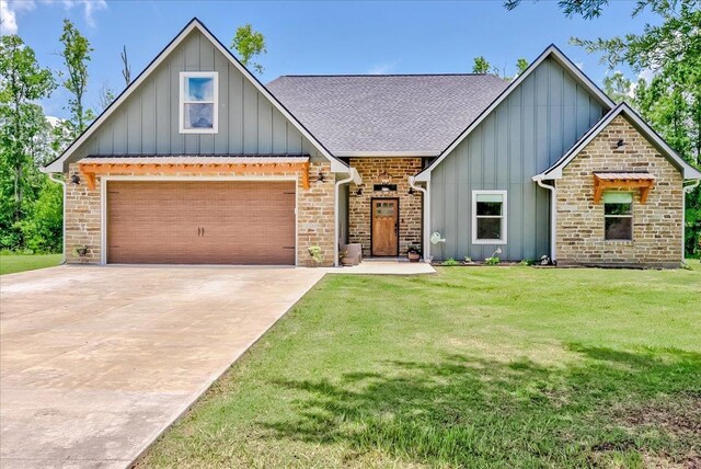 4801 Candlewick Dr, Orange, TX 77630 - view of front of house featuring board and batten siding, a shingled roof, a front lawn, concrete driveway, and stone siding