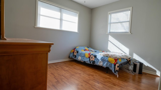 bedroom featuring light wood-type flooring