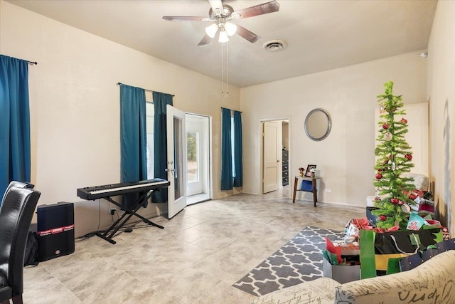 interior space featuring ceiling fan