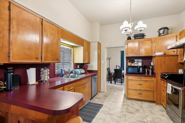 kitchen with dishwasher, an inviting chandelier, sink, decorative light fixtures, and range