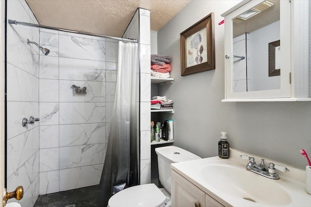 bathroom featuring vanity, a textured ceiling, toilet, and curtained shower